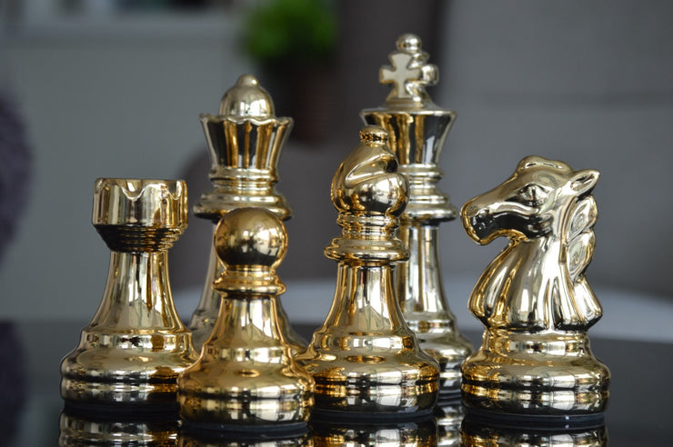 Gold Chess Pieces - iSurfaces
